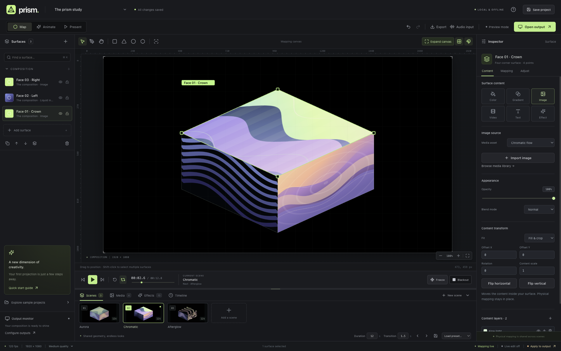 Prism studio showing three individually mapped cube faces, animated content, scenes, and projector controls